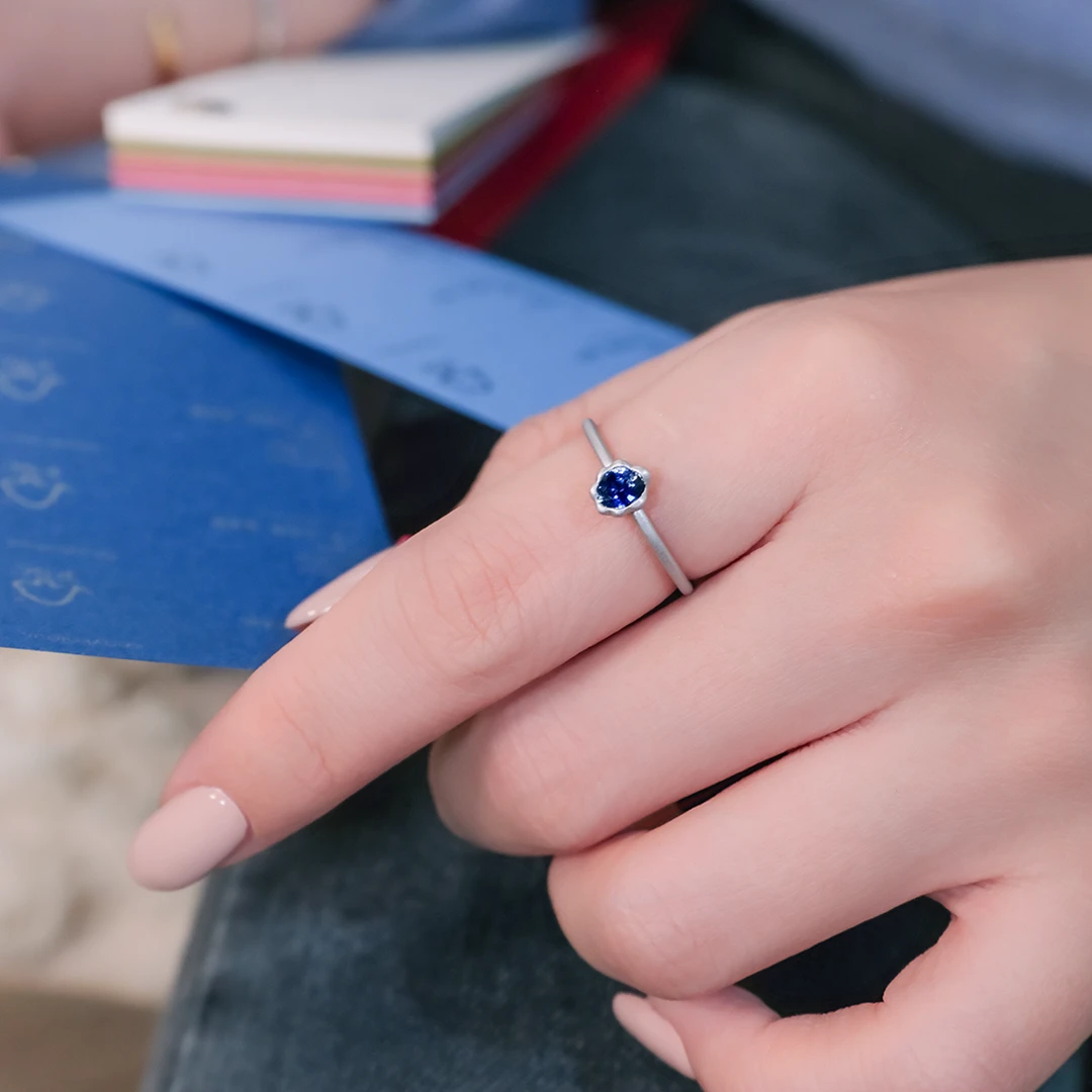Melted gold blue sapphire ring